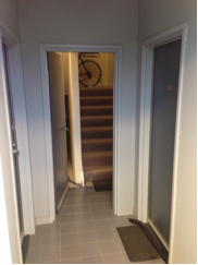 Entry to unit 210 showing internal stairs.png